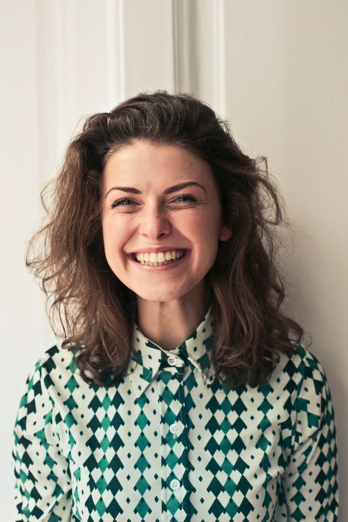 Portrait of the host, mid-laugh